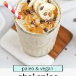 Overhead view of a chai banana smoothie with text overlay that reads "paleo & vegan chai spice banana smoothie: creamy + dreamy + delicious"