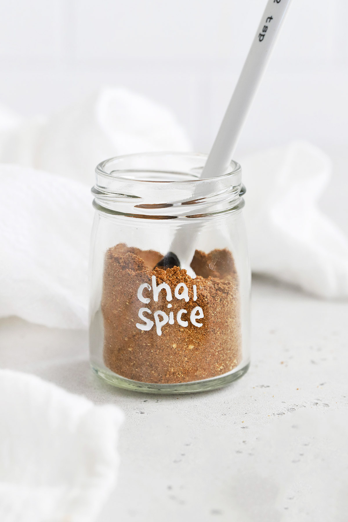 Front view of a jar of homemade chai spice mix