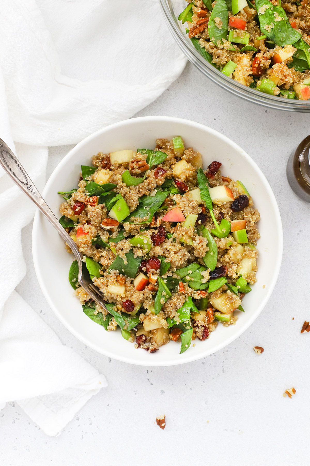 Overhead view of a bowl of healthy powerhouse quinoa salad with balsamic dressing