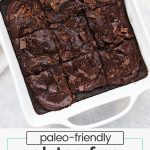 overhead view of gluten-free chocolate zucchini cake with chocolate frosting, cut into squares