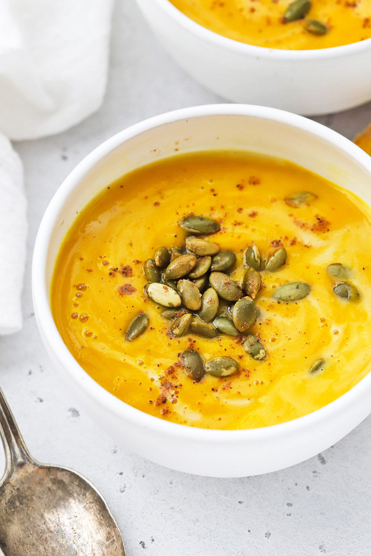 Front view of Panera Autumn Squash Soup Copycat in white bowls