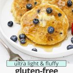 fluffy gluten-free blueberry pancakes on a white plate