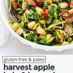 Front view of Harvest Apple Kale Brussels Sprouts Salad with Balsamic-Herb Dressing with text overlay that reads "Gluten-Free & Paleo Harvest Apple Kale & Brussels Salad: Simple + Healthy + Delicious"