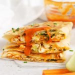 Front view of buffalo chicken quesadillas cut into quarters