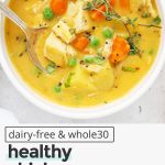 Overhead view of two bowls of healthy dairy-free chicken pot pie soup with gluten-free biscuits with text overlay that reads "dairy-free & whole30 healthy chicken pot pie soup: cozy + creamy + comforting"