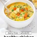 Front view of two bowls of healthy dairy-free chicken pot pie soup with gluten-free biscuits with text overlay that reads "dairy-free & whole30 healthy chicken pot pie soup: cozy + creamy + comforting"