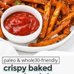 Front view of crispy baked sweet potato fries served with ketchup with text overlay that reads "paleo & whole30-friendly crispy baked sweet potato fries & amazing fry seasoning!"