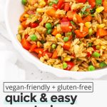 Front view of a serving bowl of healthy vegetarian fried rice with colorful veggies with text overlay that reads "gluten-free + vegan-friendly vegetarian fried rice: quick + easy + healthy"