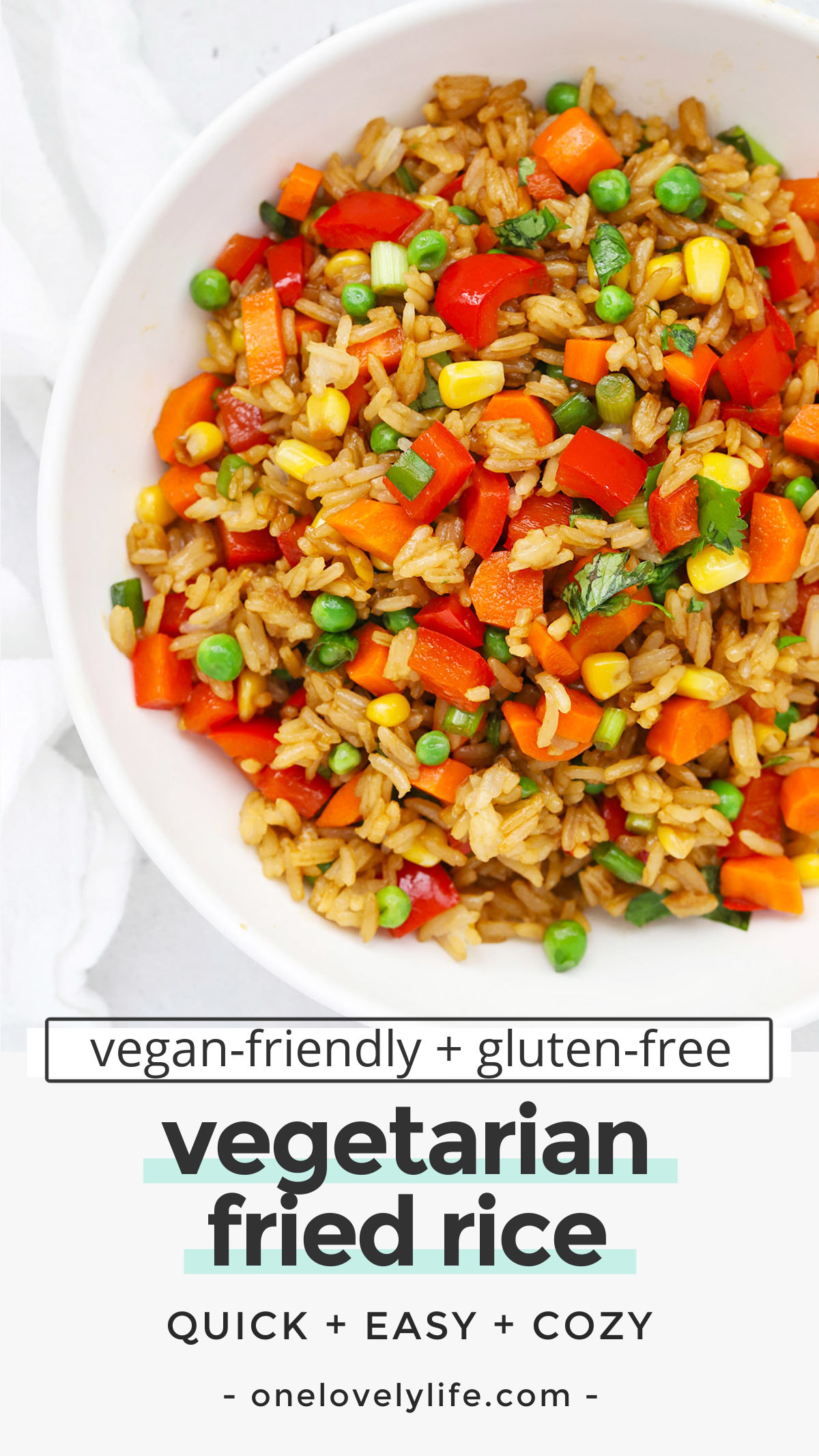 Vegetarian Fried Rice - This healthy fried rice recipe is loaded with colorful veggies and delicious flavor. Serve as a side with all your favorites! (Vegan-Friendly, Gluten-Free) // Vegan Fried Rice // Gluten Free Fried Rice // Easy Dinner // Quick Dinner // Take Out Fake Out // Takeout Copycat Fried Rice
