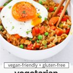 Front view of two bowls of healthy vegetarian fried rice topped with a sunny-side up egg with text overlay that reads "gluten-free + vegan-friendly vegetarian fried rice: quick + easy + healthy"