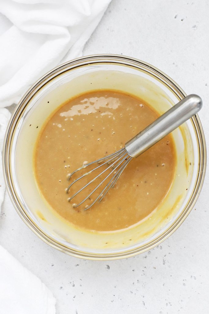 Freshly mixed homemade honey mustard dressing or dip