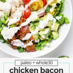 overhead view of chicken bacon avocado salad drizzled with paleo ranch