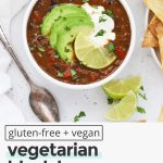 vegan black bean soup with sliced avocado and lime