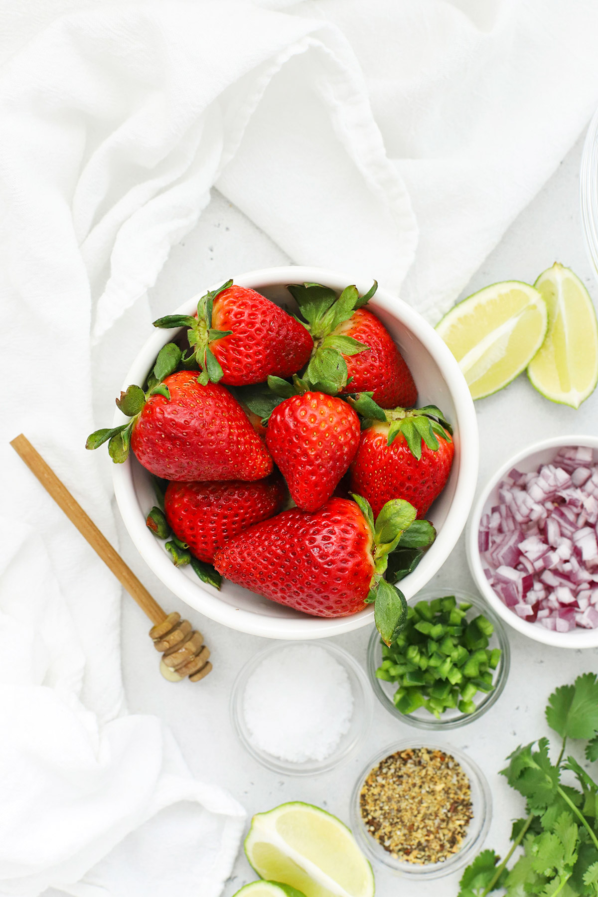 Overhead view of ingredients for strawberry salsa