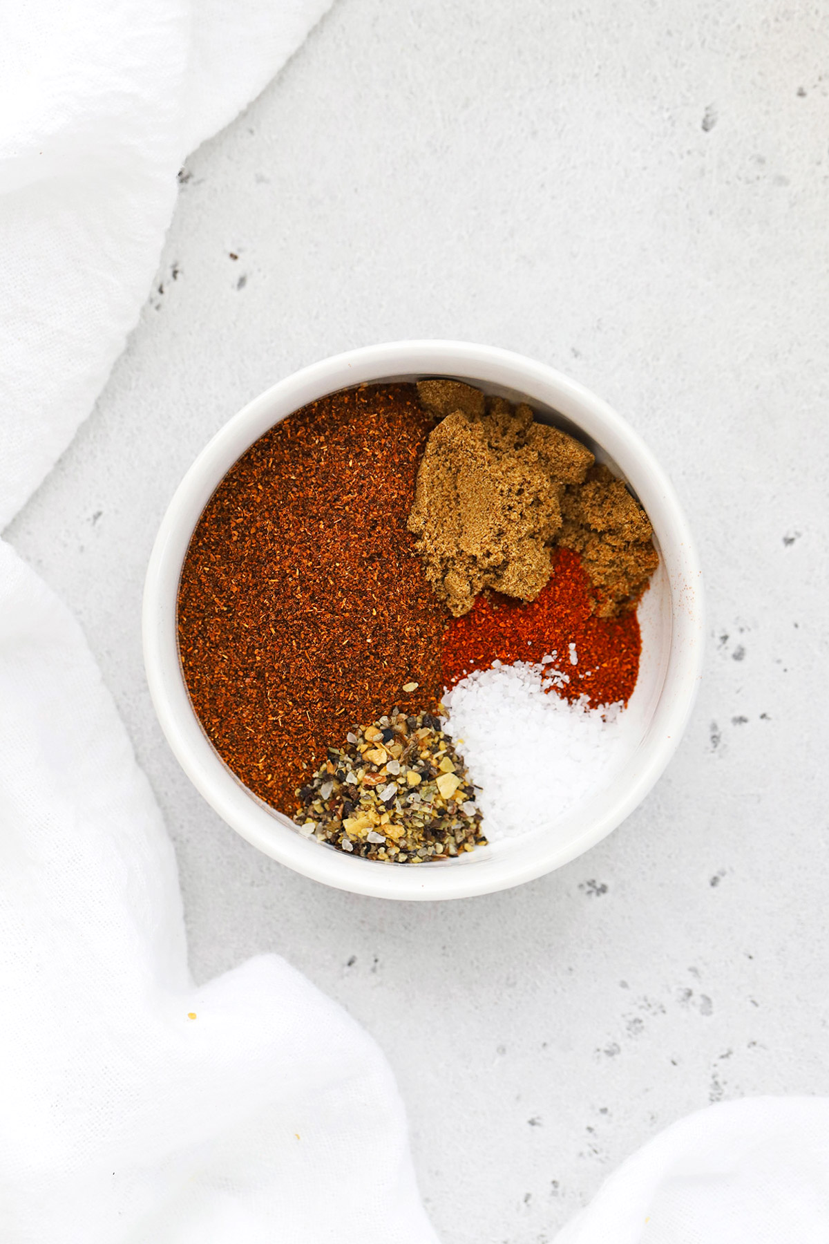Overhead view of a bowl of chili seasoning for making ground chicken chili