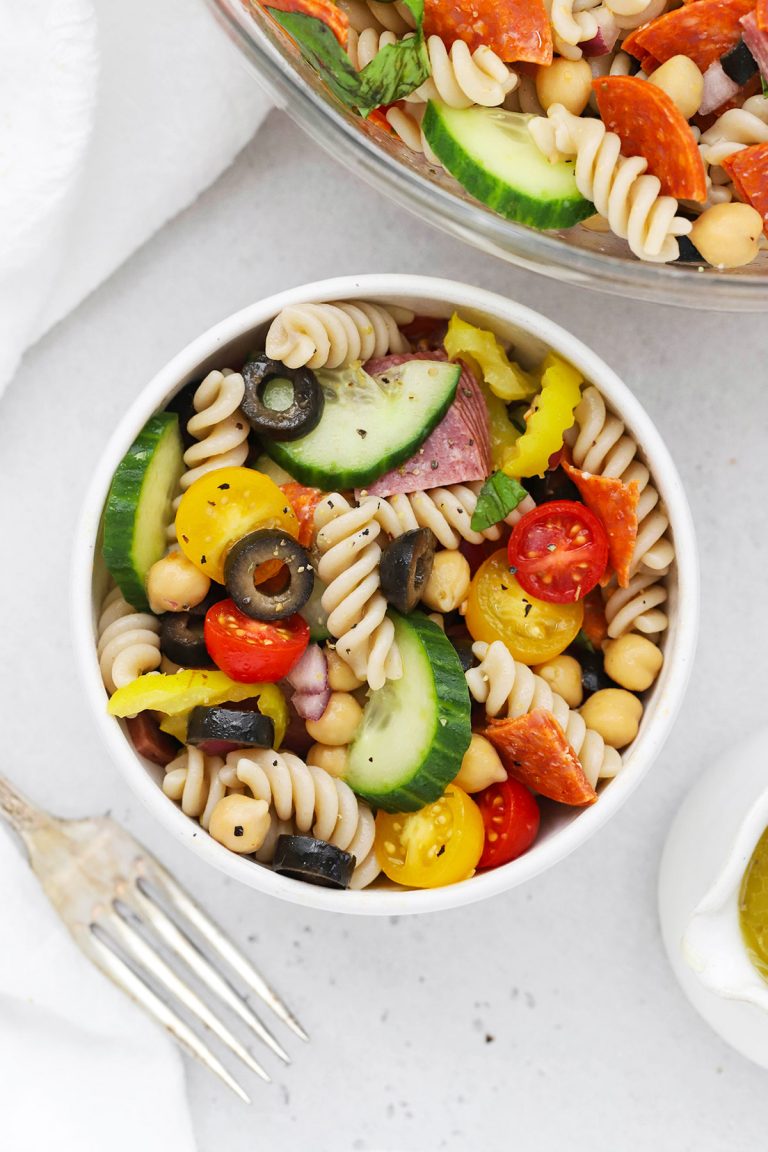 Overhead view of a bowl of gluten-free pasta salad with italian dressing