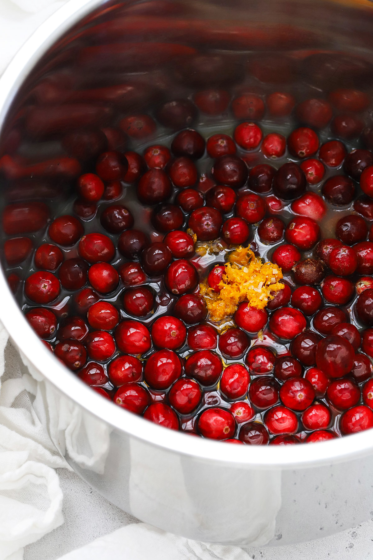 Ingredients for pressure cooker cranberry sauce added to an instant pot