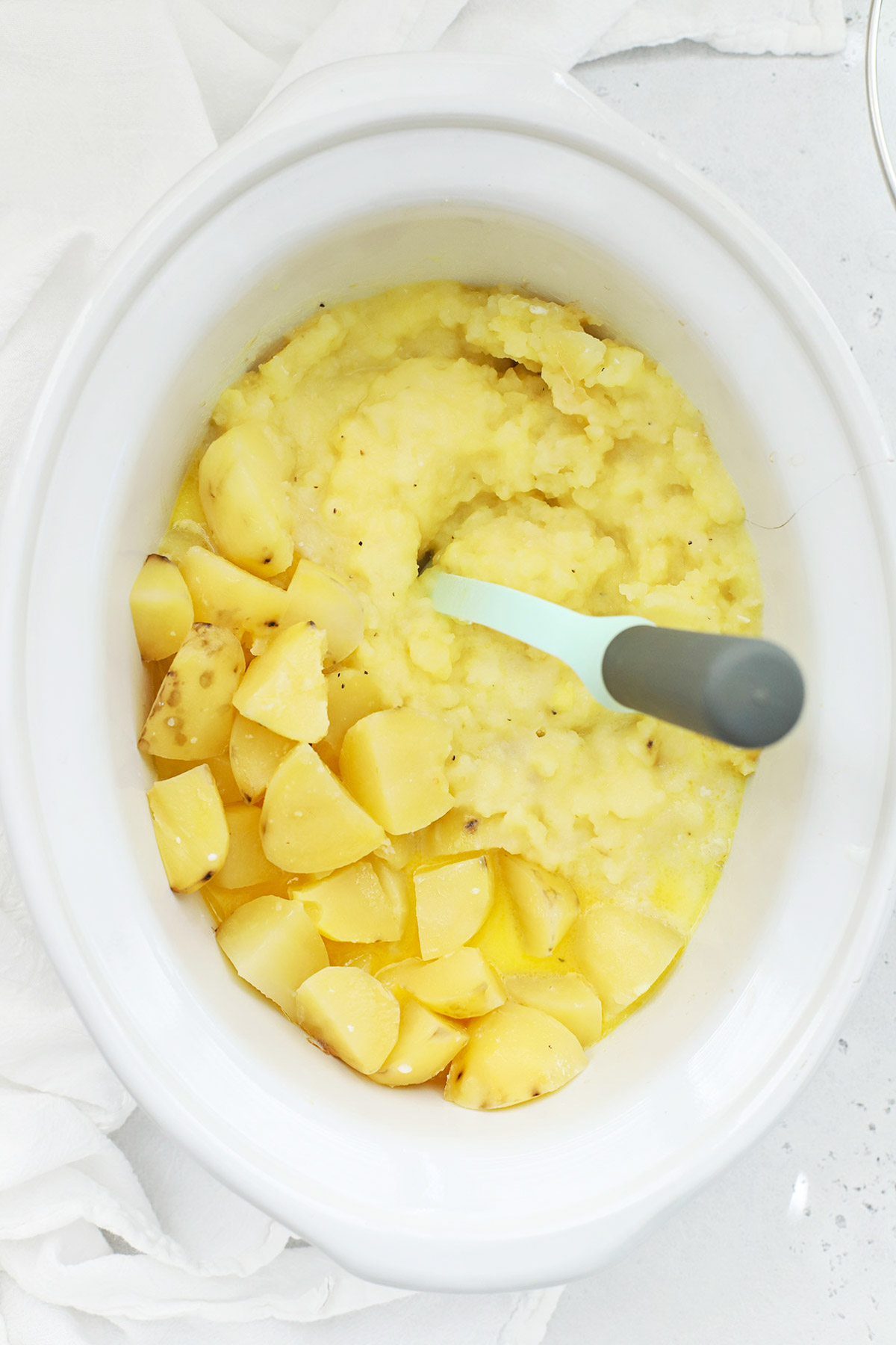 mashing potatoes in a slow cooker