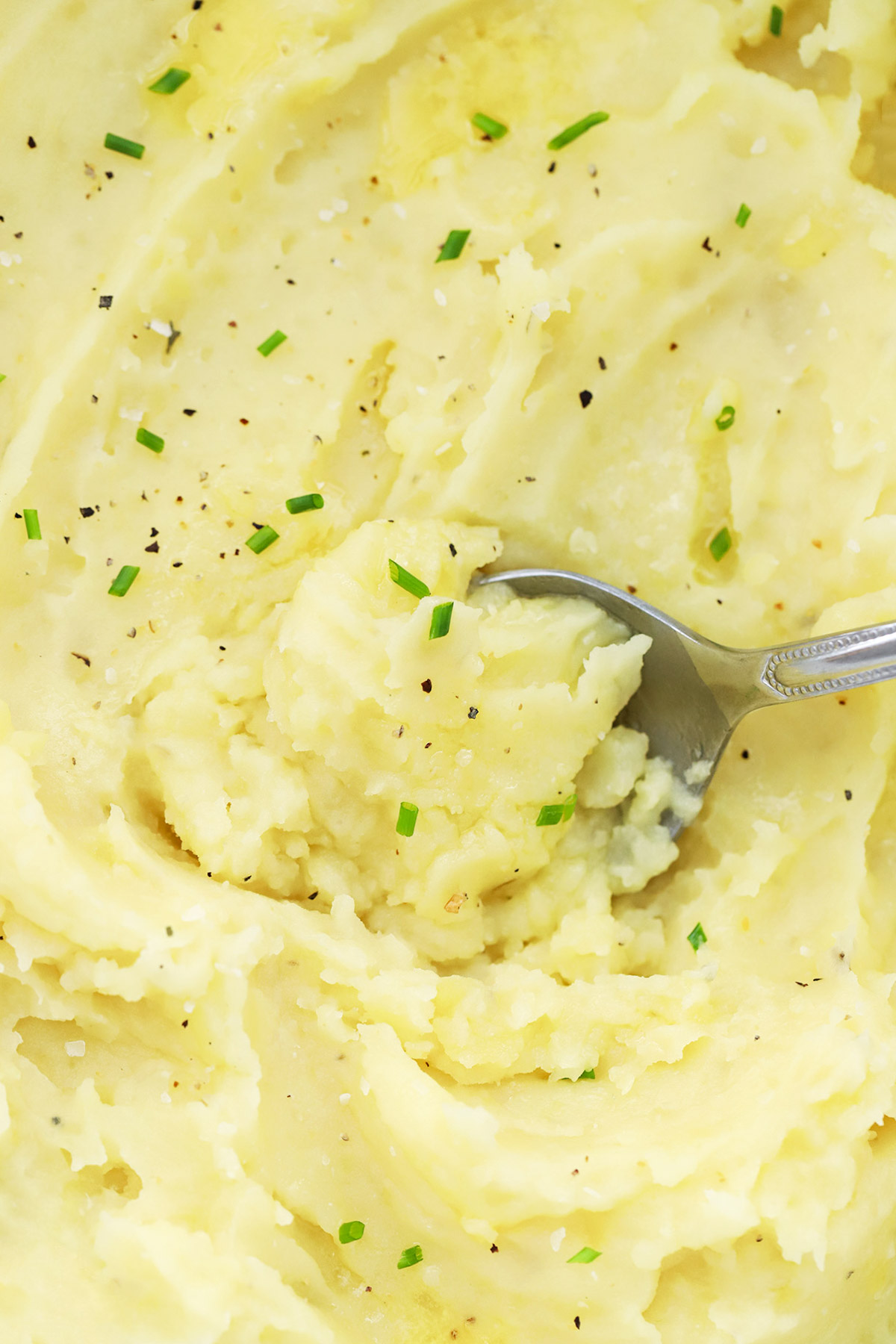 Close up view of fluffy crock pot mashed potatoes