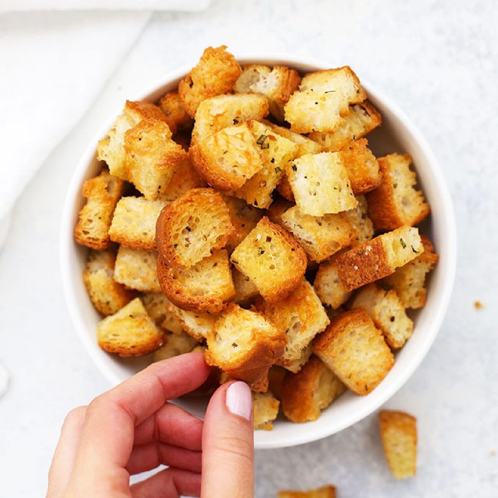 gluten-free croutons in a white bowl