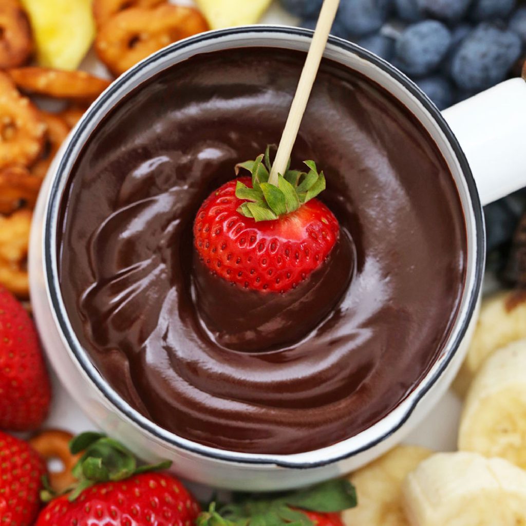dairy-free chocolate fondue with colorful fresh fruit