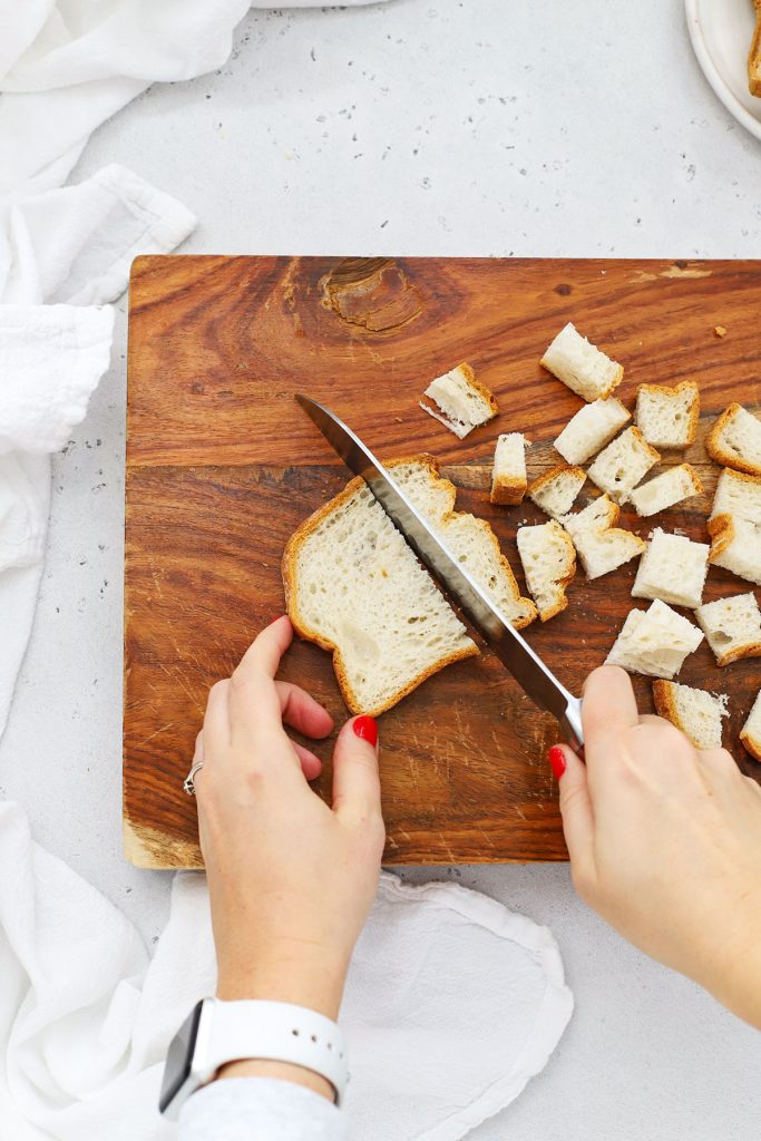 dicing gluten-free bread into cubes