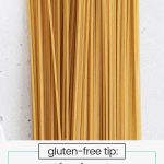 dry gluten-free spaghetti on a white background
