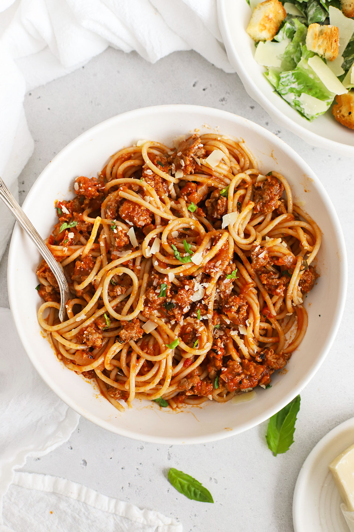 Gluten-free spaghetti tossed with gluten-free spaghetti sauce and parmesan cheese