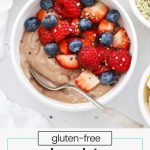 Chocolate protein yogurt bowl with fresh berries, hemp hearts, and cacao nibs