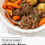 A plate of gluten-free pot roast with carrots and potatoes