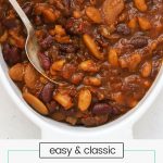 slow cooker baked beans in a white crock