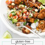 gluten-free chicken burrito bowl with rice, beans, salsa, and guacamole
