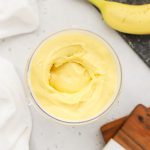thick mango banana smoothie in a blender