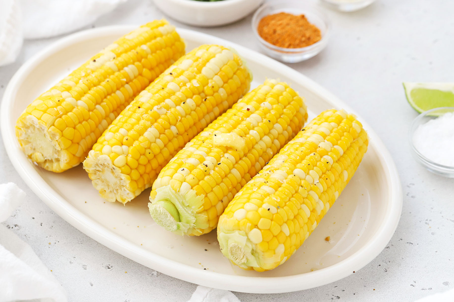 boiled corn on the cob with butter, salt and pepper