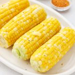 boiled corn on the cob with butter, salt and pepper