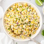Esquites salad in a white bowl