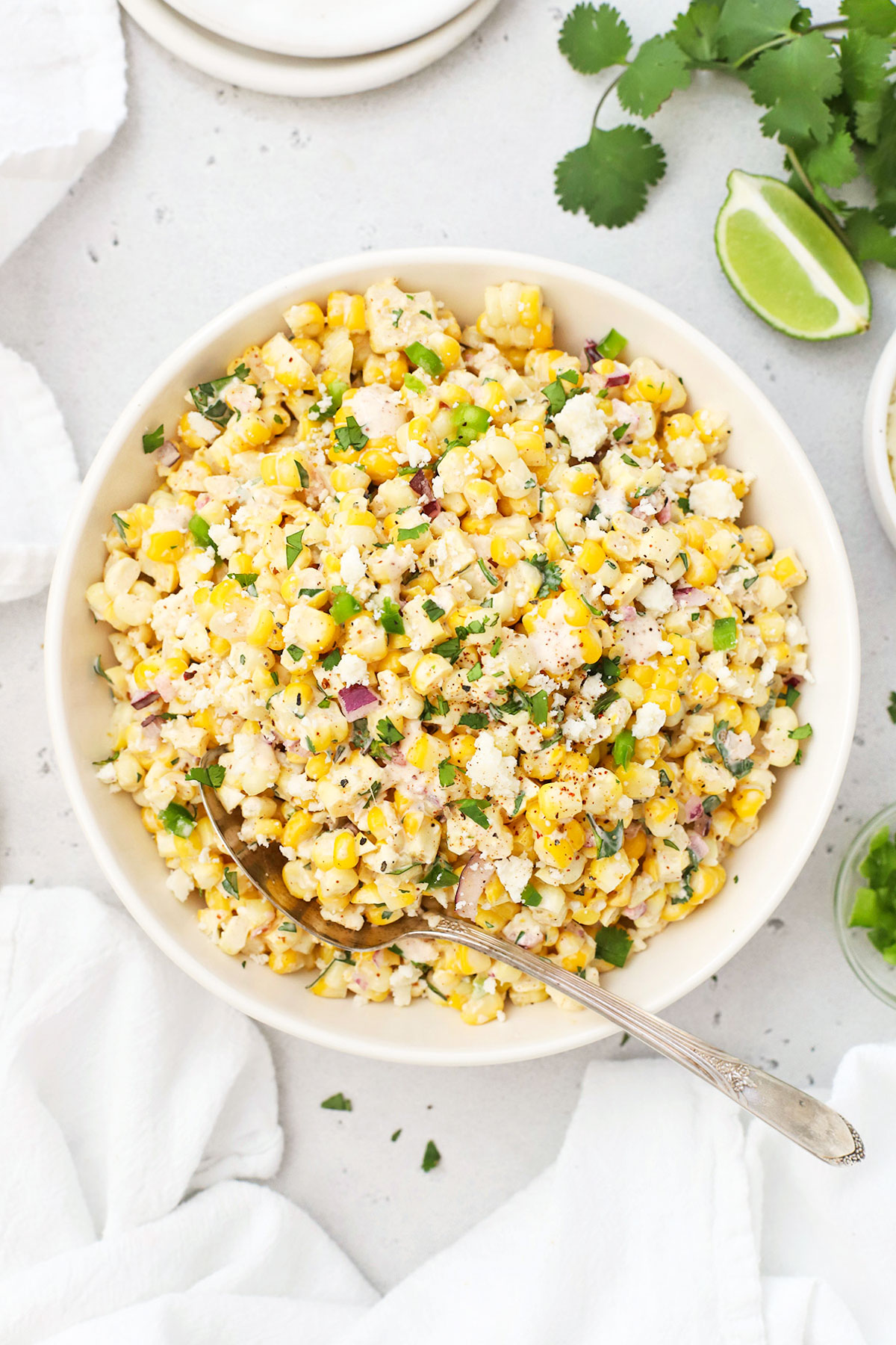 Esquites salad in a white bowl