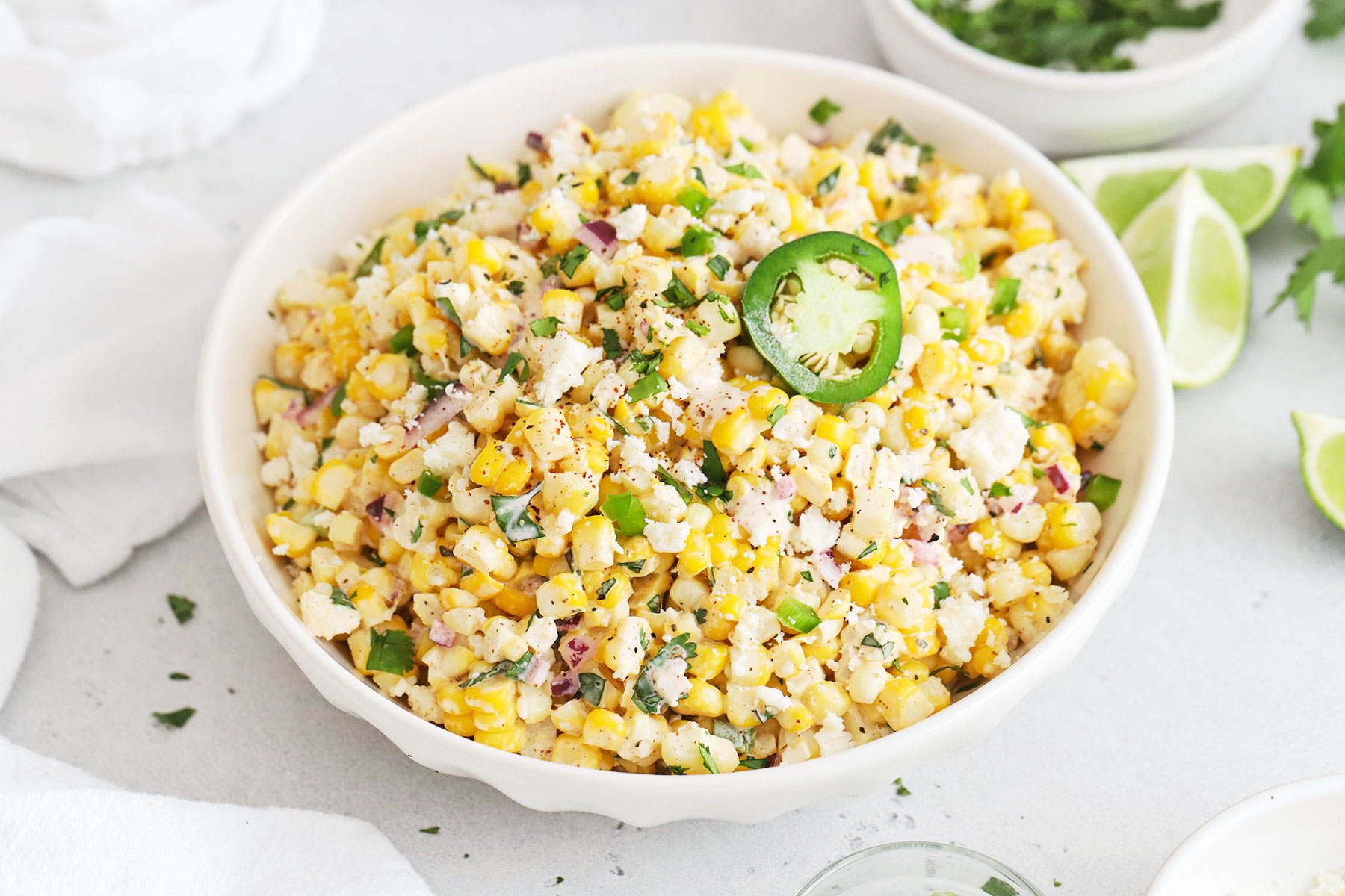 mexican street corn salad in a white bowl