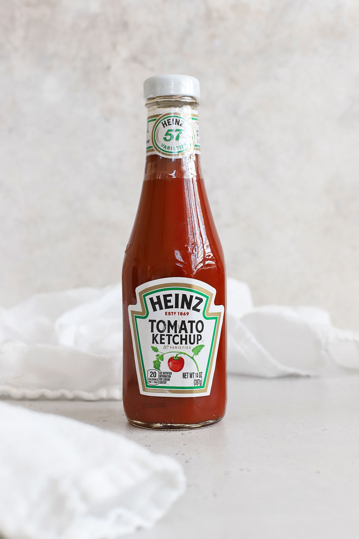 a bottle of heinz ketchup on a white background