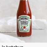 a bottle of heinz ketchup on a white background