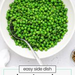 cooked frozen peas in a white bowl