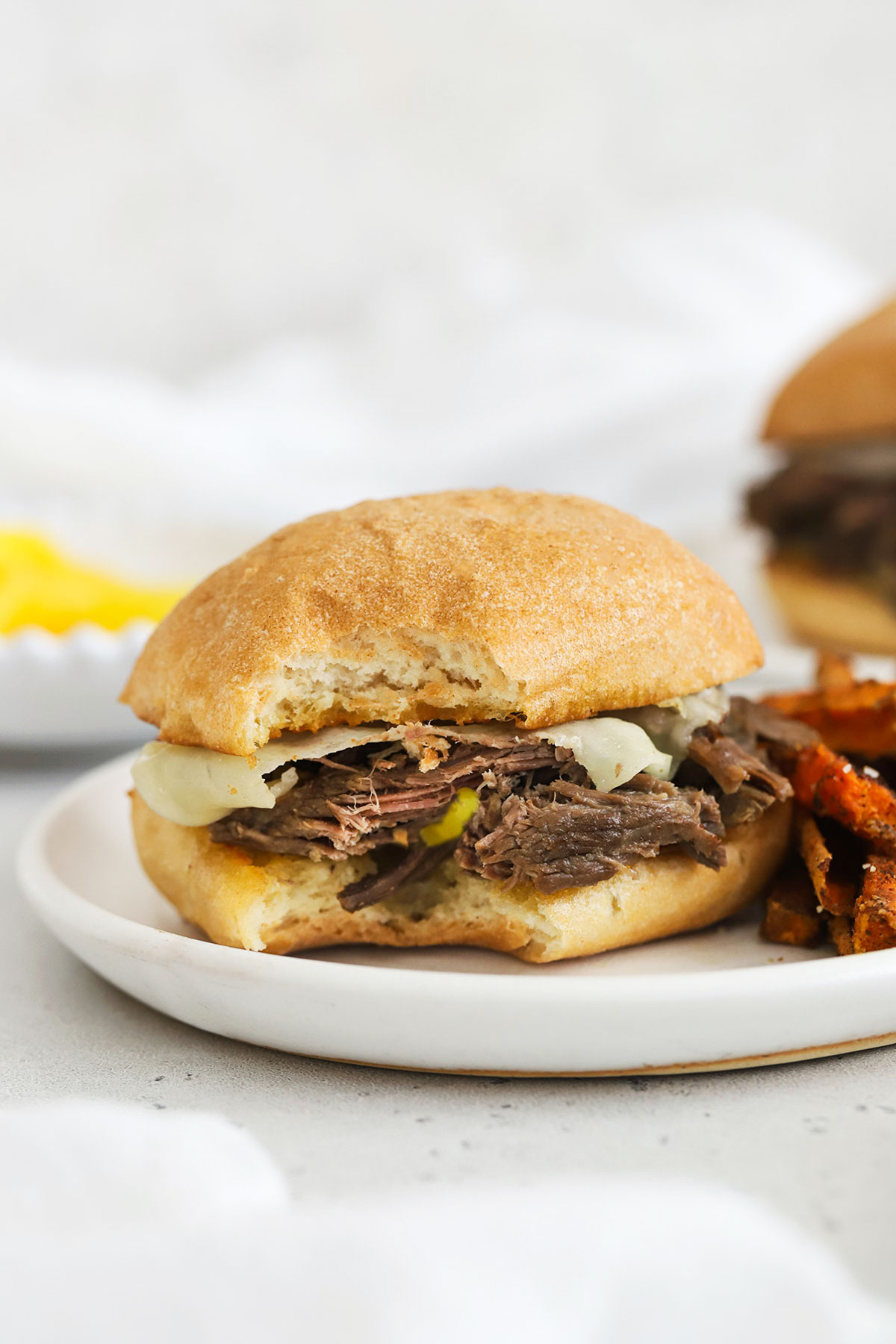 Slow cooker italian beef sandwich with peperoncinis