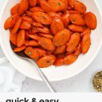 simple glazed carrots in a white bowl