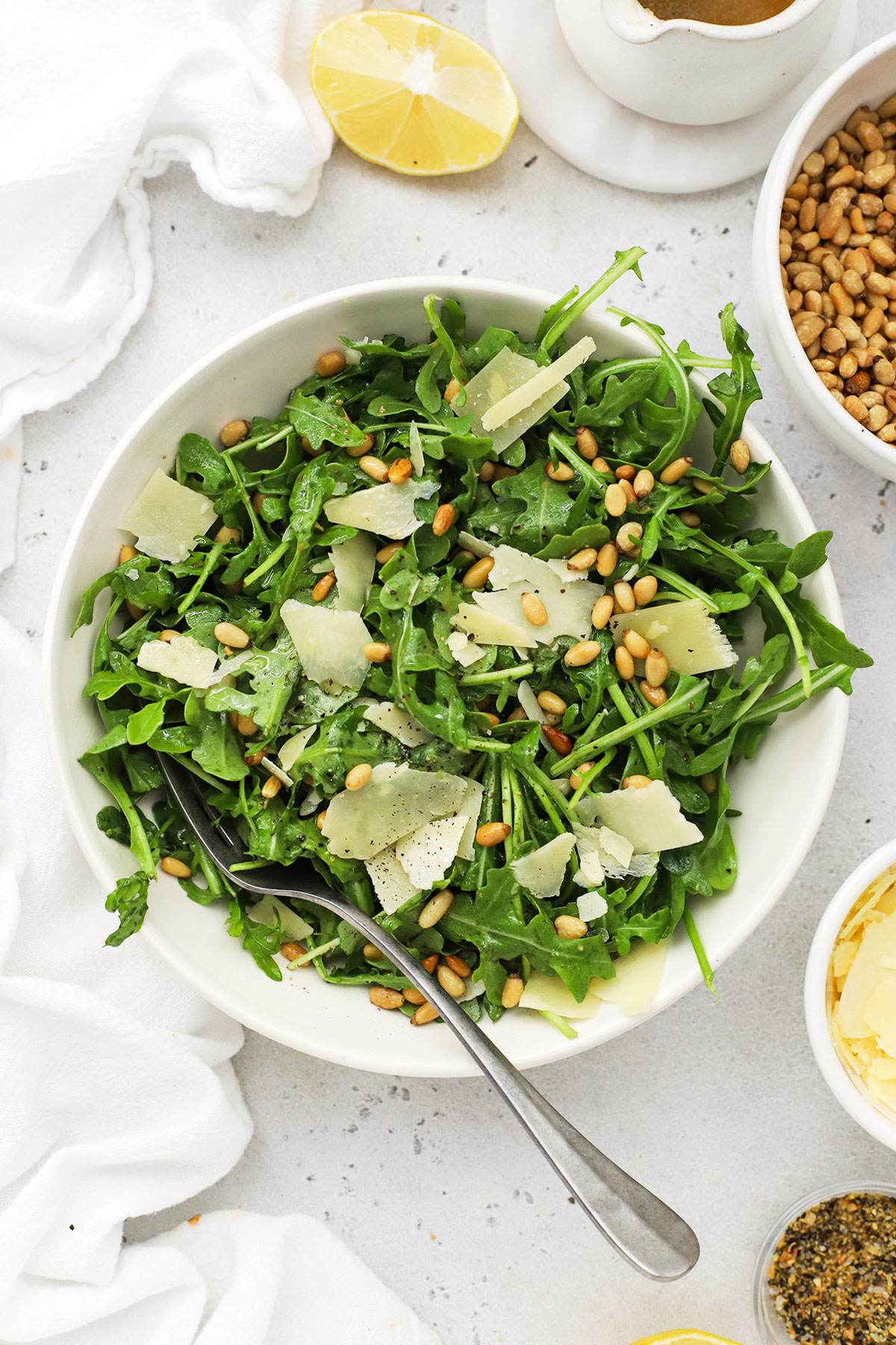 arugula salad with shaved parmesan and toasted pine nuts