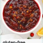 a bowl of homemade cranberry sauce topped with orange zest
