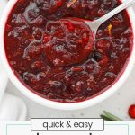 a spoon scooping homemade cranberry sauce
