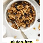 a bowl of gluten-free cinnamon raisin granola with almond milk