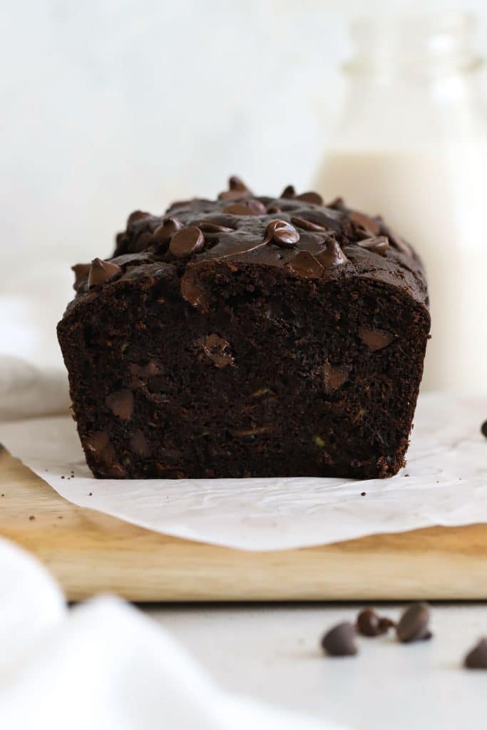 a loaf of gluten-free chocolate zucchini bread cut into slices