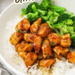 Sticky honey garlic chicken over rice with broccoli