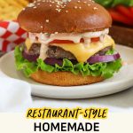 A cheeseburger with homemade burger sauce